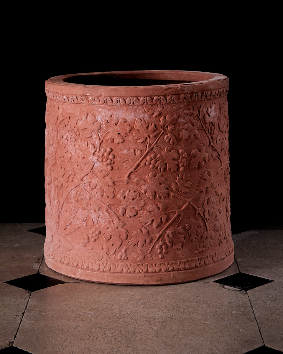 terracotta romanesque cylinder pot